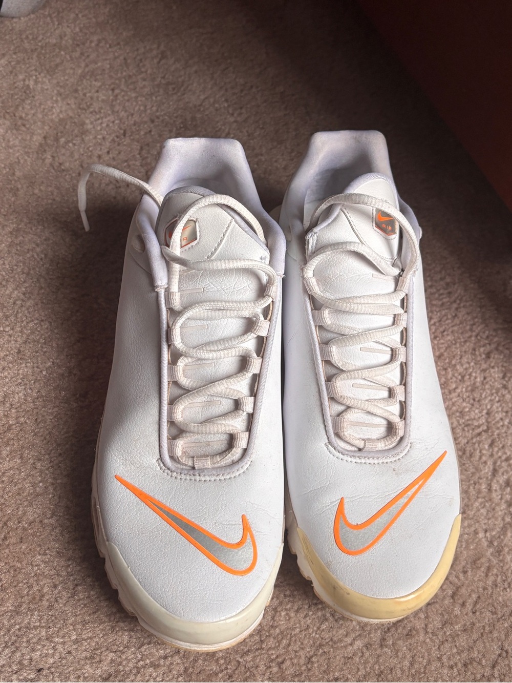 Nike White Sneakers with Orange Swoosh